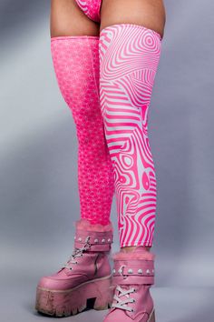 Add some electrifying fun to your rave outfit with Electricity Leg Sleeves! These quirky sleeves will light up your look and keep your legs feeling snug and supported all night long. So go ahead, dance the night away with a playful spark in your step! ⚡️ Product Details: Duality but Neon Pink 🩷 UV Reactive FRW Exclusive! Leg Sleeves Soft and Stretchy Made on Recycled Material ♻️ 85% Recycled PET Polyester, 15% Spandex Handmade in San Diego, CA Satisfaction Guaranteed Lifetime Warranty *Talia is wearing a size X-Small. Due to varying screen display settings, you may see some fabric images brighter or darker than the real fabric. So please consider that tolerance before ordering based on the website images. We won't be responsible for complaints regarding coloring. Rave Outfits With Pants, Trendy Fitted Pink Leg Warmers, Fitted Rave Bottoms For Music Festival, Fitted Rave Style Bottoms For Music Festival, Rave Bottoms For Club In Spring, Pink Rave Bottoms For Party, Spring Rave Bottoms For Club, Stretch Leg Warmers For Festivals, Pink Rave Party Bottoms