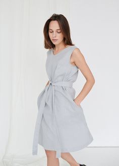 "SIZING & FIT This garment is true to size, and we recommend choosing the size you usually wear. If you want the garment to be loose-fitting, choose a larger size than you usually wear. Before placing an order, check the approximate measurements of the finished garment given below. Model is 5′6″ (170cm) tall with a 80cm/31″ bust, 68cm/26″ waist, 91cm/35″ hip, and she is wearing an XS in ice grey. XXS Length ± 105cm | 41.3\" Bust ± 92cm | 36.2\" Armhole ± 44cm | 17.3\" Hem width ± 134cm | 52. V Neck Linen Dress, Gray Summer Dress, Midi Linen Dress, Linen Dress Summer, Joy Dress, Linen Sundress, Ice Dresses, Midi Sundress, Summer Linen Dresses