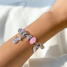 Description:Chic Pink Luminous Glow In The Dark Ball Charm Open Cuff BangleSpecification:Size: Dia 2.55"Weight: 0.81 oz/pcsMaterial: copper. alloy metal. luminous stone. cubic zirconiaColor: silverFeatures & Details:This handmade diy cz inlaid angel wing luminous stone charm cuff bangle bracelet is made of nickel-free. lead-free. cadmium-free and hypoallergenic materials. which will not turn your skin green or cause anaphylactic reaction.It is easy to match your different outfits and also suitable for any occasions like wedding. banquet. costume party. engaged party. prom. anniversary. holiday. evening party or other social events. where let you look elegant. attractive and fashionable.You can give it directly as a gift to your lover. wife. girlfriend. daughter. and your friends for valent Luminous Jewelry For Gift, Luminous Silver Jewelry For Party, Pink Metal Charm Bangle Bracelet, Nickel-free Pink Crystal Bracelet As A Gift, Pink Metal Crystal Bracelet, Wedding Banquet, Cuff Bangle Bracelet, Enamel Bracelet, Chic Pink