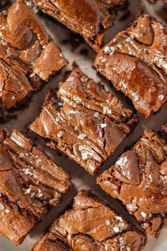 brownies cut into squares on a white plate