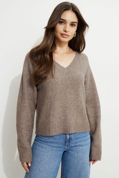 This is a knit sweater. Designed to be a relaxed fit with a soft stretch fabric. With Heavenlyarn™, you'll love showing off your softer side. Features - Rib knit V-neck, hem, and cuffs Size & Fit - Relaxed fit - Stretch fabric - Model is wearing size XS Materials & Care - 57% Recycled Polyester, 23% Acrylic, 17% Nylon, 3% Spandex - Hand wash, cold - Imported Sweater Brown, Weekend Outfit, How To Show Love, Brown Sweater, Online Sales, V Neck Sweater, Sale Event, Long Tops, Vneck Sweater