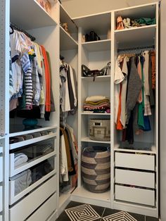 an organized closet with clothes and baskets