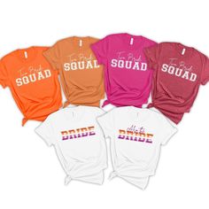 six different colored t - shirts with the word squad in white, red, orange and pink