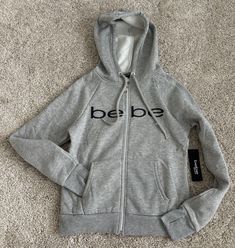 BEBE SPORT GRAY LOGO HOODED SWEATSHIRT  SIZE SMALL NEW WITH TAGS Winter Loungewear Sweatshirt With Logo, Sporty Hoodie Top With Logo Detail, Sporty Hoodie Top With Logo, Sporty Hoodie With Logo Detail, Fall Hoodie With Logo Detail For Loungewear, Athleisure Hoodie Sweatshirt With Logo Detail, Fall Loungewear Hoodie With Logo Detail, Logo Detail Hoodie For Fall Loungewear, Fall Loungewear Hoodie With Logo