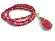 This necklace is made of red howlite gemstones and agate pendant, gold filled: beads, toggle clasp and findings.  This necklace measures 31 inches in length and the pendant is about 2 inches. All of our jewelry is unique and custom designed. Most of our jewelry can easily be resized. If there is a piece of jewelry that you are interested in, but would like some changes made, please do not hesitate to contact us.  We appreciate your shopping with Jewelry by CARMAL and hope you will do so often! Please see other items in our shop: http://www.jewelrybycarmal.etsy.com Follow us on twitter to always be informed of new listings, promotions and sales: http://www.twitter.com/jewelrybycarmal Red Agate Beaded Necklaces, Red Multi-strand Gemstone Beads Necklace, Elegant Handmade Red Beads, Gems, And Cabochons, Sodalite Necklace, Bohemian Red Beads, Gems, And Cabochons, Schmuck Gold, Gold Schmuck, Fashion Beads, Red Agate Beads, Gems And Cabochons