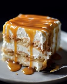 a piece of cake with caramel drizzle on top