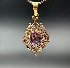 Excellent condition, this Victorian Filigree 18k Gold Pendant is perfect for that special wedding day, birthday , or just any day. Measures 40mm x 25mm , Total weight 6.65g Elegant Gold Amethyst Ring With Intricate Design, Elegant Purple Locket Jewelry, Victorian Gold Oval Amethyst Ring, Purple Oval Filigree Jewelry, Gold Oval Amethyst Ring For Gift, Antique Amethyst Ring In Yellow Gold For Gift, Gold Oval Amethyst Ring Hallmarked, Gold Amethyst Jewelry With Filigree Detail, Oval Large Pendant Jewelry For Wedding