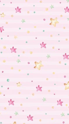 a pink wallpaper with gold stars and polka dots on the bottom half of it