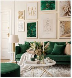 a living room with green couches and pictures on the wall