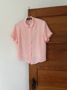 Sweet pink cold rayon blouse with button closure down the front, and sawtooth trim detail on collar and shoulder.  Condition: Discoloration on back.  shoulder: 15" pit to pit: 20" length: 22" Rayon Blouse, Rose Pale, Rose Vintage, Trim Detail, Womens Clothing Tops, Blouses For Women, Blouses, Bathing Beauties, Trim