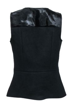 Elevate your date night look with the cozy-chic Theory "Etia" top. Crafted from soft wool with a sleek calf fur yoke, this sleeveless style oozes feminine edge. The peplum silhouette and flattering v-neck cut create the perfect evening look- just add leather pants and your favorite black heels! Size M Shell 90% Wool, 10% Nylon Lining 100% Polyester Yoke 100% Calf Fur Hidden side zipper Sleeveless Peplum style V-neck Bust 33" Waist 30.5" Shoulder to hem 23" Peplum Styling, Peplum Styles, Buy Shoes Online, Cozy Chic, Night Looks, Soft Wool, Black Wool, Sweater Weather, Black Heels