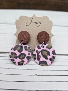 Welcome to The Foxy Earring Shop! Check out these pink and brown pattern leopard earrings! They are cute for the spring or any season throughout the year.  The walnut wood connector is 15mm in diameter. A stainless steel connector combines the wooden connector with the pink and brown leopard print circle measuring 1 ×1 inch. The leopard print faux leather has a soft feel and is backed by brown suede like material making this circle sturdy.  A rubber push backing keeps the earring in place.  These earrings are lightweight and comfortable to wear.  Earrings will be shipped in an organza bag, color of my choosing, making this a perfect gift! Thanks for visiting my shop! Wood Connectors, Valentines Day Earrings, Leopard Earrings, Animal Print Earrings, Pink Animal Print, Leopard Prints, Spring Earrings, Pink Animals, Brown Pattern