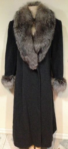 Marvin Richards ladies women's winter sliver fox fur floor length coat jacket size 14/ L/ XL     Charcoal coat with  Sliver fox fur trim from Finland    Size 14   M/ L So Chic and Classy The coat will be suitable for a tall lady Floor length coat   The coat is so elegant and beautiful   Please look at the actual measurements below   Please note that this coat is Rare to find   The sale for a unique and elegant coat hard to find any where. The full length coat in 100% lambswool with Genuine slive Formal Winter Faux Fur Coat, Formal Fur Coat With Faux Fur Trim, Formal Outerwear With Faux Fur Trim, Long Winter Outerwear For Evening, Long Winter Evening Outerwear, Winter Evening Faux Fur Coat, Elegant Winter Fur Coat With Feather Trim, Formal Long Fur Coat For Winter, Elegant Long Fitted Fur Coat