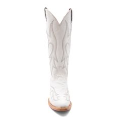 A classic silhouette of the true western dress boot for any occasion. Accented with an understated stitch, a fashion toe and heel to give a sense of elegance and class. Fitted Boots With Reinforced Heel For Rodeo, Elegant Snip Toe Boots For Rodeo, Fitted Ranch Boots With Leather Sole, Elegant Round Toe Boots For Rodeo, Fitted Heeled Boots With Leather Sole For Ranch, Ranch Boots With Stacked Heel And Snip Toe, White Boots With Stacked Heel And Snip Toe, Fitted White Boots For Country Events, Fitted Western Boots For Country Events