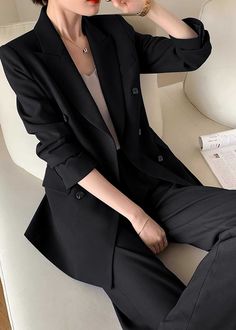 Elevate your professional wardrobe with the Monica Black Pants Suit Two-Piece Set. Crafted with a sophisticated black hue and double-breasted closure, this set exudes luxury and exclusivity. The straight-leg pants and tailored blazer provide a timeless and tasteful look for any business occasion. Blazer: Double Breasted closure Notched lapels Long sleeves Front flap pockets Pants Zip fly with button closure Side slant pockets Regular length - Polyester, spandex- Item #43197- Women's blazer & pan Tailored Suits Women, Tailored Suit Women, Black Blazer Women, Black Double Breasted Blazer, Mafia Wives, Styles Clothes, Black Pant Suit, Dark Academy, Pockets Pants