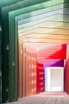 an image of a hallway that looks like it is made out of colored corrugated sheets