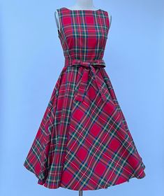 Christmas Red Plaid Tartan Dress Holiday Quality Rayon with spandex Machine Wash Cold, Line Dry Knee length Blet included, which is designed to move around.  Sizes --- -Bust（inch） ---Waist (inch）----Length From Waist To Bottom( inch) Xs         -- 32-33        ------    24           ------27 S       ---   34-35        ------     26             -----27 M     ---    36-37       ------      28            ----- 27  L         --   38-39       ------     30             -----27 XL        -- 40-42 Red Stretch Sleeveless Mini Dress, Fitted Red A-line Sleeveless Dress, Red Stretch A-line Dress, Fitted Plaid Holiday Dress, Fitted Plaid Dress For Holiday, Casual Red Sleeveless Stretch Dress, Casual Red Stretch Sleeveless Dress, Red Fitted Sleeveless Mini Dress, Christmas Red Stretch Dresses