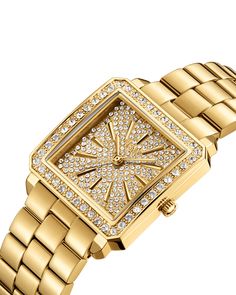 Inspired by the refraction of light and designed to shine brilliantly from all angles, the Cristal set makes a glamorous statement on the wrist. The 28 MM square face features 12 genuine diamonds marking the hours, complemented by 303 Austrian crystals adorning the dial and bezel. A matching, 18K gold-plated stainless steel bangle wraps around the wrist with 144 Austrian crystals, completing the seamlessly sparkling look. Elegant Diamond Watch With Bling, Gold Crystal Diamond Watch For Party, Elegant Cubic Zirconia Bling Watch, Elegant Gold Watches With Crystal, Elegant Crystal Watch With Rhinestones, Elegant Diamond White Watch With Bling, Elegant Watch With Rhinestones And Crystal, Gold Crystal Diamond Watch For Formal Occasions, Elegant Diamond Watch With Crystal