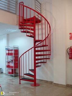 there is a red spiral staircase in the corner of this room with white walls and tile flooring