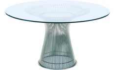 a round glass table with metal base on an isolated white background for use as a centerpiece