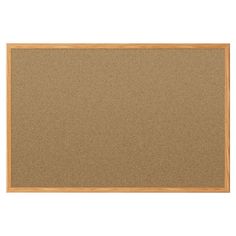 an empty cork board on a white background