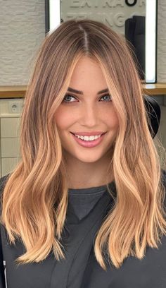 38 Best Hair Colour Trends 2022 That'll Be Big : Bronde Lob Hairstyle Dark Roots With Strawberry Blonde Hair, Rooted Honey Blonde Hair, Brown Balayage To Blonde, Dark Blonde With Strawberry Highlights, Short Honey Blonde Hair Dark Roots, Hair Colours For 2024, Golden Blonde Brown Hair, Honey Blonde Long Bob, Golden Blonde Hair Dark Roots