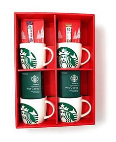 four starbucks coffee mugs in a red box