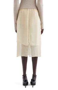 Spring Chiffon Skirt With Sheer Details, Sheer Beige Bottoms For Spring, Elegant Cream Asymmetrical Skirt, Elegant Sheer Skirt For Spring, Elegant Cream Skirt For Daywear, Cream Silk Flowy Skirt, Flowy Cream Silk Skirt, Elegant Sheer Tiered Skirt, Summer Silk Skirt In Cream