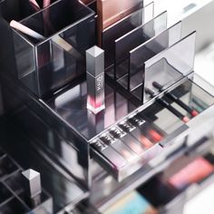 an assortment of cosmetics and lipsticks on display