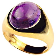 Elegant ring of oval Amethyst cabochon of 8.28ct in a custom bezel setting of gold rhodium over Sterling Silver. The ring is perfect for daily and on into evening wear. Amethyst is the February birthstone and is said to protect from intoxication and evil spells. It will calm your spirit and give you focus. Pure quartz is colorless, but the most prized variety is Amethyst, the purple variety. It's always been considered a 'royal color' and is featured in the British Crown jewels. It was also a favorite of Catherine the Great and Egyptian royalty. For centuries this beautiful gemstone has been considered a symbol of power. No changes by seller. Sizable 8 which you local jeweler should be able to make. MR2313 Luxury Cabochons With Bezel Setting, Luxury Round Cabochons With Bezel Setting, Luxury Oval Gemstone Cabochons, Luxury Yellow Gold Oval Cabochon Gemstones, Luxury Formal Cabochon Amethyst Ring, Luxury Round Cabochon Amethyst Ring, Luxury Formal Amethyst Cabochon Ring, Luxury Amethyst Cabochon Ring For Formal Occasions, Classic Round Cabochon Gemstones