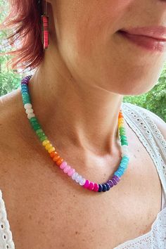 Wear the rainbow with this joyful and colorful gradient gemstone necklace. Faceted rondelle beads gives this necklace just the right amount of sparkle. Wear this as a statement necklace or stack it in a neckmess with your other favorites. ✨The Magic is in the Details✨ Necklace Lenth: 19"-21" (adjustable)Clasp: Lobster clasp and chainApprox. Bead Size: 8x5mmMaterial: Dyed Jade* Jade is sensitive to sunlight and water. Prolonged exposure to either one will cause these beads to fade over time. ✌🏼? Multicolor Single Strand Rondelle Beaded Necklaces, Multicolor Rondelle Beaded Necklaces Single Strand, Multicolor Rondelle Beaded Necklace Single Strand, Rainbow Rondelle Gemstone Bead Necklaces, Rainbow Rondelle Gemstone Beads Necklace, Rainbow Rondelle Gemstone Beaded Necklace, Colorful Gradient, Detailed Necklace, Rainbow Necklace