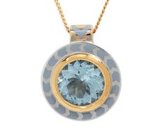 With its stunning, hand-painted design and cool toned color, this captivating Alice Cicolini necklace is a statement-making take on the traditional colored stone pendant. The round, sky blue aquamarine shimmers from the center of the 22K yellow gold bezel at the center of the sterling silver cupped pendant where it is framed in a gray lacquer design. The back of the pendant is painted with a blue geometric floral design and it hangs from the 14K yellow gold bale at the center of the 18K yellow g Fine Jewelry In Light Blue Color, Fine Jewelry In Light Blue, Luxury Light Blue Necklace For Formal Occasions, Luxury Light Blue Round Jewelry, Fine Jewelry Aquamarine Necklace, Light Blue Round Fine Jewelry, Turquoise Blue Topaz Round Necklace, Luxury Light Blue Necklace For Gift, Blue Medallion Jewelry With Polished Finish