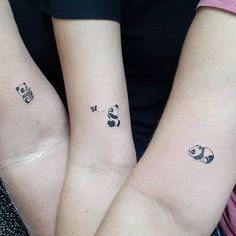 two people with matching tattoos on their arms