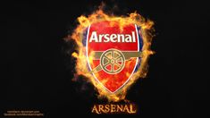 an image of the logo on fire with flames around it that reads, arsenal