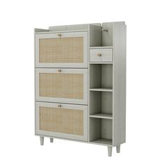 a white cabinet with wicker doors and drawers on the bottom, in front of a white background