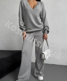 Gray hollow out knitted pantsuit is incredibly stylish and comfortable!  Our suit is knitted from natural cotton yarn with the addition of viscose, pleasant to the touch and to the body, consists of a deep V neck sweater and straight fit pants.  The suit can be worn anywhere, as an elegant casual for every day, walking, shopping, traveling and much more.   DETAILS  - beige - 80% cotton, 20% viscose  - knitted pattern  - loose fit  - deep V neck - straight fit pants   SIZES   This suit is available in 3 sizes XS-S,  M-L and XL-XXL  Dropped sleeve 31.5"/ 80 cm  Back length 25.6"/ 65 cm  Pants length 42.9"/ 109 cm  Inseam 30.7"/ 78 cm Size  XS - S  bust 84-88cm = 33.08-34.64 inches,  waist 63-67cm = 24.8 - 26.37 inches  hips 92-96 = 36.22-37.80 inches.   M-L BUST 36-37.7 inches / 92-96 cm WAI Terno Outfit, Deep V Neck Sweater, Straight Fit Pants, Knitted Suit, Womens Suits, Suit For Women, Pants Suit, Elegant Casual, Outfit Women