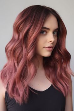 Evoke the soft, romantic vibes of fall with a dusky rose radiance. The soft pink hues blended into a brunette base provide a beautiful, feminine touch. Click here to check out more balayage hair colors for fall to upgrade your look. Bayalage Brunette Pink, Desert Rose Hair Color, Rose Balayage Brunettes, Dusky Pink Hair, Subtle Pink Balayage Brunette, Summer Hair Color Balayage, Dimensional Pink Balayage, Dark Blonde Pink Balayage, Pink Balayage Brunette