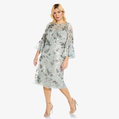 Striking And Glamorous, We Added An Ethereal Layer To Our Classic A-Line Cocktail Dress And Finished It In Soft Botanical Embroidery And Sprinkles Of Handsewn Sequins. Loving The Feminine Sheer Illusion Yoke And Three-Quarter Sleeves (With Bell Cuffs!) With Mesh Lining For Added Comfort And The Easy Flare At The Hem. A Standout At Cocktail Hours, Nights Out, Weddings, We Could Go On. Imported Dry Clean Main Fabric Content: 100% Polyester Secondary Fabric Content: 100% Polyester Lining Content: 1 Spring Sequin Lace Dress Embellished, Glamorous Embroidered Dresses For Festive Occasions, Glamorous Embroidered Festive Dresses, Glamorous Festive Embroidered Dress, Festive Embroidered Glamorous Dresses, Elegant Lace Sequin Dress For Spring, Elegant Spring Lace Sequin Dress, Elegant Spring Sequin Lace Dress, Elegant Embroidered Dress With Sequins For Festive Occasions