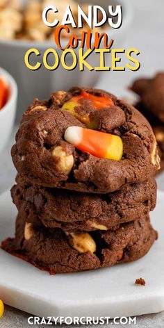 chocolate candy corn cookies stacked on top of each other with the title in the middle