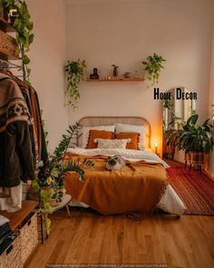 a bed sitting in a bedroom next to a wooden shelf filled with potted plants