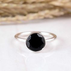 Natural Black Obsidian Ring Dainty Obsidian Gemstone Ring Women Obsidian Ring Crystal Healing Jewelry Obsidian Ring Minimalist Obsidian Ring Dimension :- JEWELRY CATEGORY:- HANDMADE RING STONE NAME:-  Obsidian STONE SHAPE:- -Round   STONE TYPE:- Natural  PLATING:- METAL: - STERLING SILVER RING SIZE:- ALL SIZES AVAILABLE PURTY:- 925  Shipping:- All the parcels will be shipped with in 1-2 days of purchase... Payment:- We accept payment through PAYPAL only.... I make every effort to picture each it Minimalist Onyx Gemstone Ring, Black Birthstone Rings, Minimalist Black Spinel Rings As Gift, Black Sterling Silver Birthstone Rings, Black Sterling Silver Rings With Birthstone, Minimalist Black Sapphire Ring For Gift, Minimalist Black Sapphire Ring As Gift, Black Round Rings With Bezel Setting, Black Round Ring With Bezel Setting