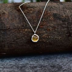 ✦ Introducing our raw citrine Necklace!  This beautiful piece is perfect for anyone who wants to enjoy the benefits of crystals and gemstones. Made with raw natural citrine, this necklace is full of positive and healing energies. The vibrant yellow colors wont go unnoticed we bet. Why because we buy raw directly from miners and use the best stone with lowest possible inclusions and with as lustrous color as possible.   This could turn out to be the ideal gift for her or someone who love Raw gems Citrine Gemstone Round Pendant Necklace, Amber Sterling Silver Necklace For Healing, Citrine Birthstone Pendant Necklaces, Citrine Birthstone Pendant Necklace, Amber Citrine Gemstone Necklace, Silver Citrine Gemstone Necklace, Silver Citrine Gemstone Necklaces, Citrine Pendant Crystal Necklace With Natural Stones, Yellow Citrine Round Pendant Necklaces