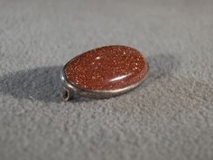 I am offering you this fabulous vintage sterling silver (stamped) with a large domed oval shaped genuine intense gold stone set in a fabulous art deco style pin brooch. What fabulous setting this is so very sleek, bold, and solid! Check out the perfect color saturation in the genuine stone, just what you want to see. It is measuring approx. 1 inch, by 1/2 inch. Look at the detail of the design work of this vintage pin brooch, simply breathtaking. It weighs approx. 5 grams. This came out of an es Rochester Ny, Gold Stone, Vintage Pins, Art Deco Style, Stone Art, Pin Brooch, Stone Settings, Deco Style, Druzy Ring