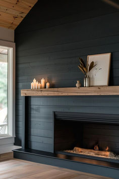 40 Cozy Dark Shiplap Wall Inspirations Dark Wood Shiplap Wall, Dark Shiplap Fireplace Wall, Navy Shiplap Fireplace, Shiplap Fireplace Slanted Ceiling, Wood Shiplap, Large Living Room Accent Wall Ideas, Dark Shiplap Fireplace With Wood Mantle, Moody Shiplap Wall, Navy Blue Fireplace Wall