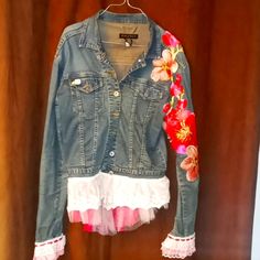 Beautiful Ladies Jean Jacket, One Of A Kind, Embellished With Care, Lace, Appliques, Ribbon. Truly Beautiful Piece And One Of A Kind, Done In Pinks, Nwot Measurements Across Shoulders 16"-17" Neck To Bottom Of Jacket 19 1/2" Nect To Bottom Of Lace 24" Fitted Pink Denim Jacket With Long Sleeves, Fitted Pink Outerwear With Floral Embroidery, Fitted Pink Denim Jacket For Spring, Pink Fitted Long Sleeve Denim Jacket, Bohemian Embellished Outerwear For Spring, Bohemian Embellished Spring Outerwear, Fitted Pink Embellished Outerwear, Pink Embellished Long Sleeve Outerwear, Pink Embellished Fitted Outerwear