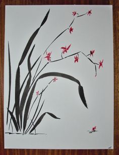 a painting with red flowers and black leaves on white paper in front of a wooden frame