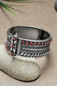 92.5 silver toned carved kada embellished with red stones. - Aza Fashions Jewellery Bangles, Red Bangles, Red Stones, Red Stone, Bangles Jewelry, Aza Fashion, Plastic Bag, Online Jewelry, Silver Color