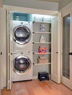 a washer and dryer in a small room