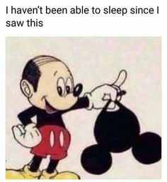 a drawing of mickey mouse holding onto a black bag