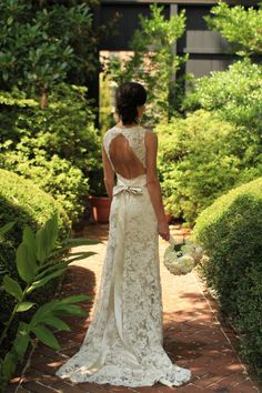 the back of a woman's wedding dress